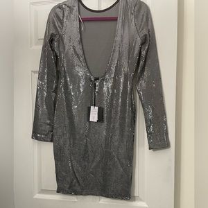 Small la nuit dress. Glittery silver. Back out beautiful dress